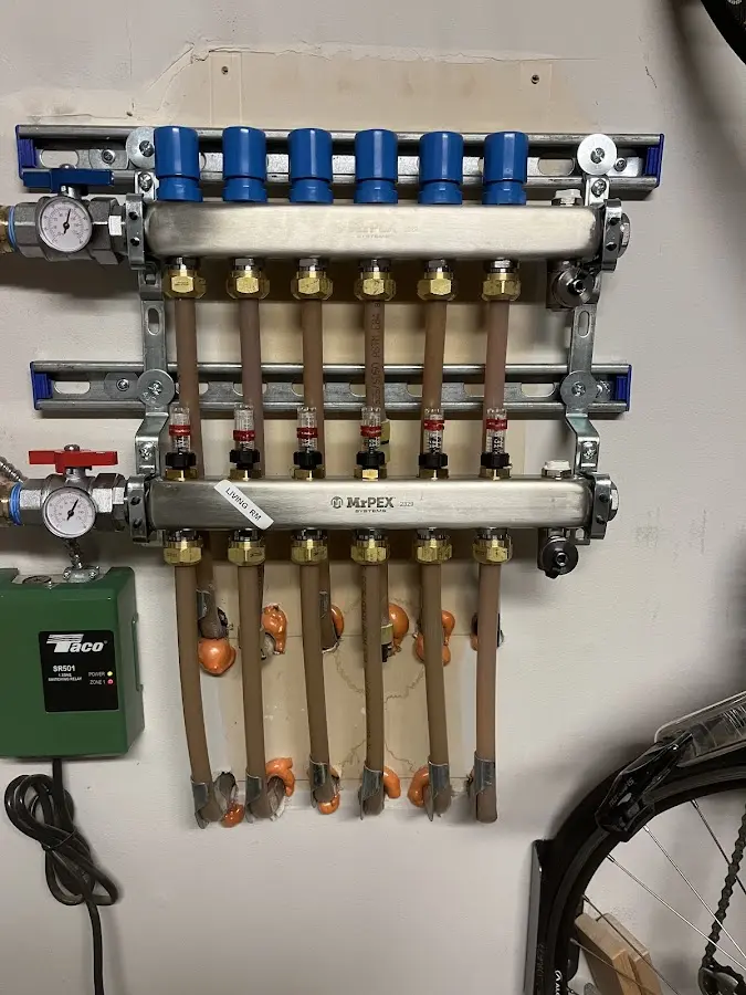 Plumber performing Water Heater Repair at a residential property in Nelsonville